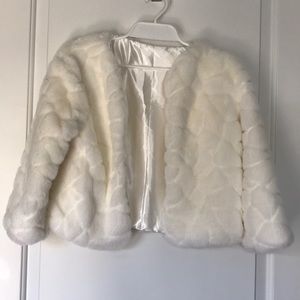 White faux fur shrug- great for over a formal gown
